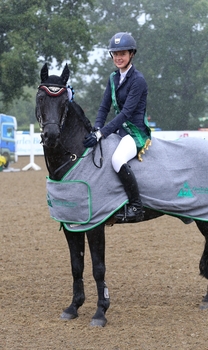 Hannah Barker wins the Charles Britton Equestrian Construction Winter JA Classic Championship